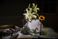Lilies And Sunflower In Clear Vases